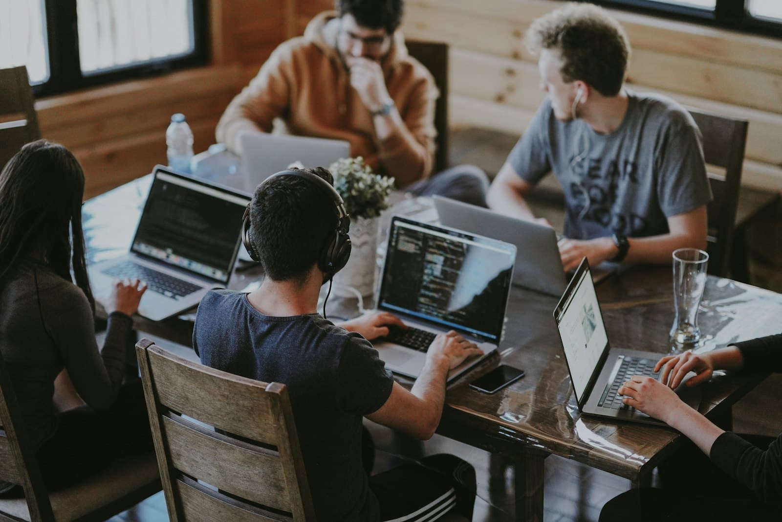 Agency team collaborating around a table
